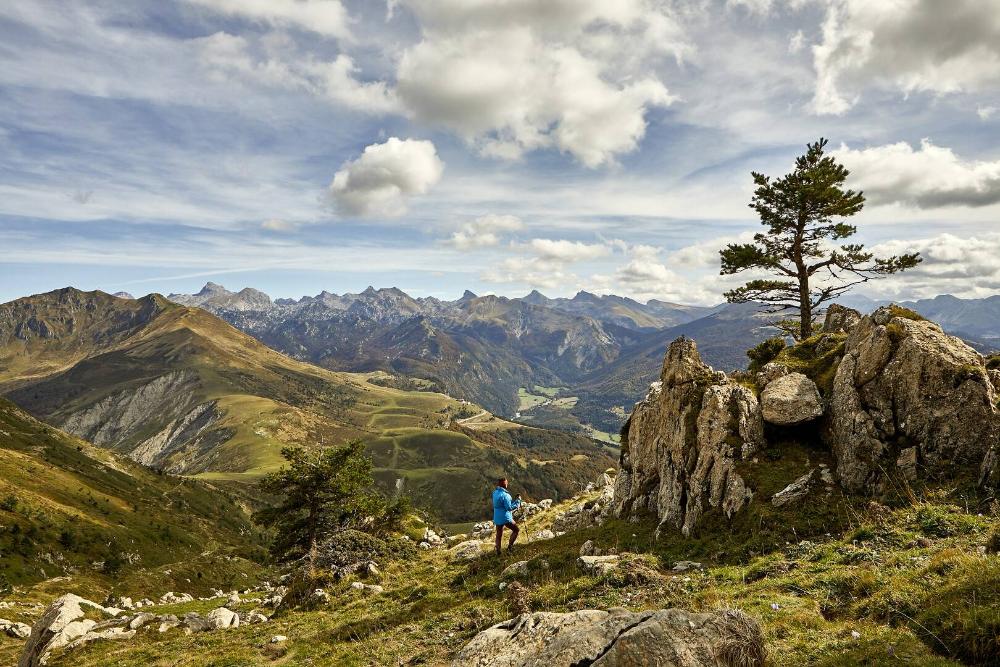 Man contemplating the mountainous landscape